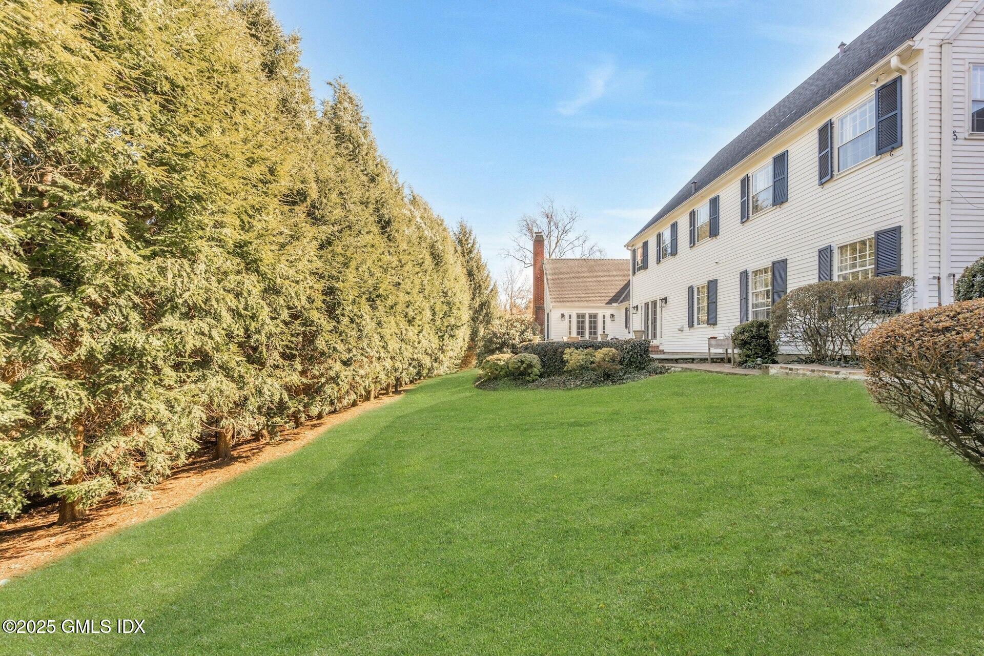 1 Ivanhoe Lane Greenwich, CT 06830 - Photo 21 of 27 a view of an apartment with a yard
