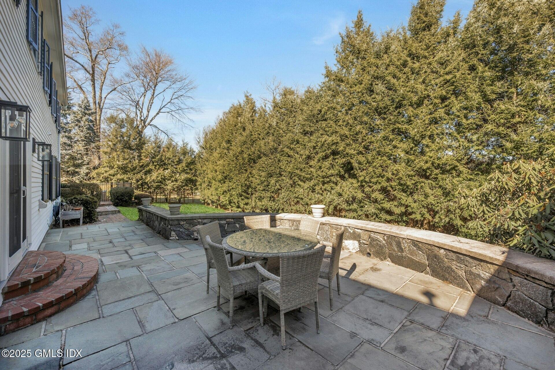 1 Ivanhoe Lane Greenwich, CT 06830 - Photo 23 of 27 a view of a chairs and table in the patio