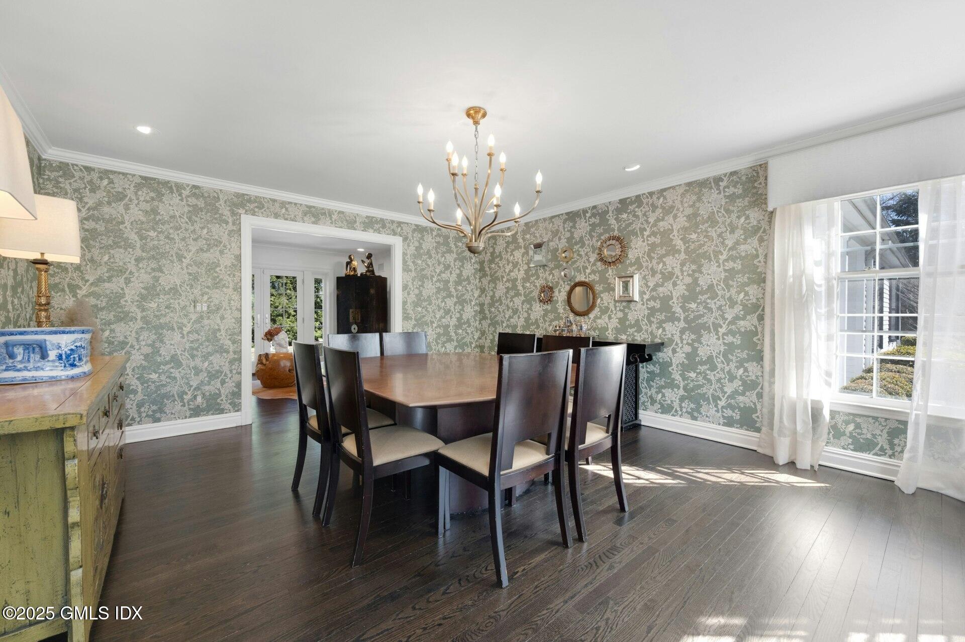 1 Ivanhoe Lane Greenwich, CT 06830 - Photo 6 of 27 a view of a dining room with furniture window and wooden floor