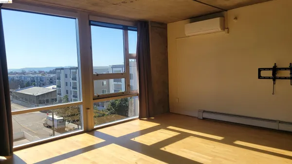 a view of a terrace with a table and chairs