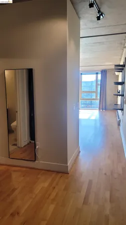 a bathroom with a bathtub a shower a sink and a mirror