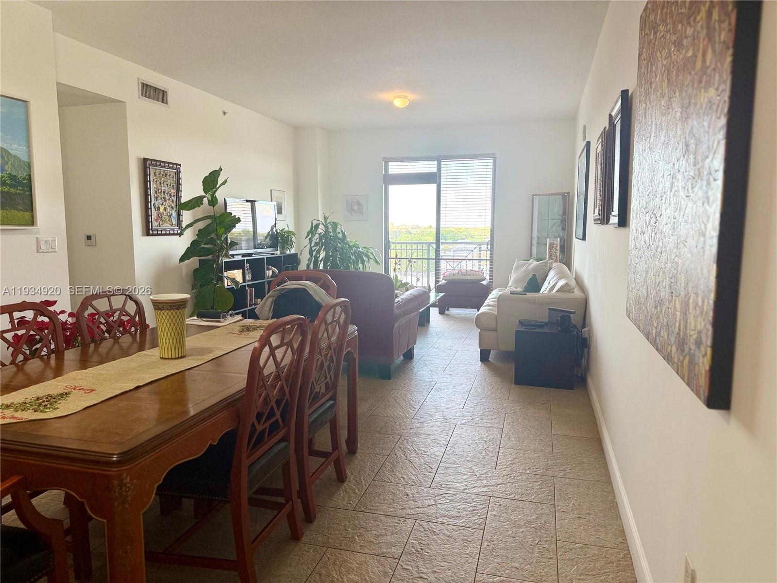 8395 Southwest 73rd Avenue, Unit 417 Miami, FL 33143 - Photo 36 of 40 Dining and Living Area