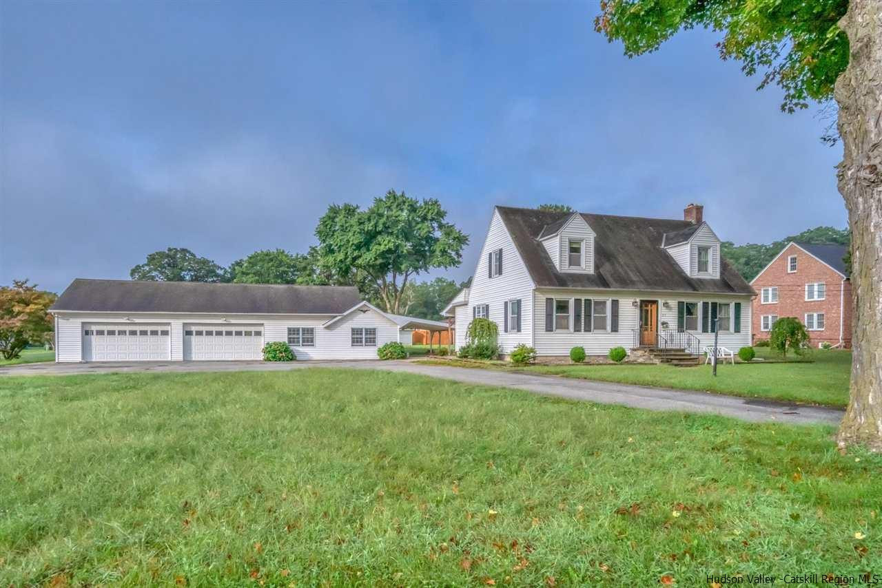 23 Spaulding Lane Saugerties, NY 12477 - Photo 1 of 35 a front view of a house with a yard and trees