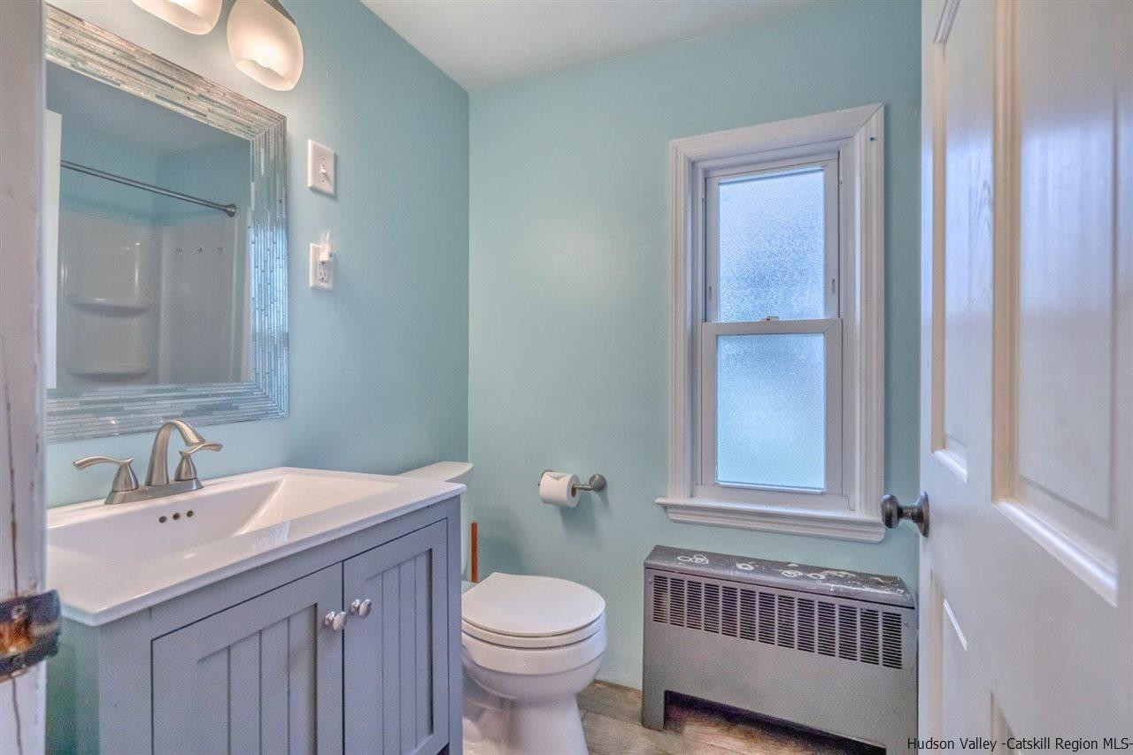 23 Spaulding Lane Saugerties, NY 12477 - Photo 15 of 35 a bathroom with a sink toilet and window