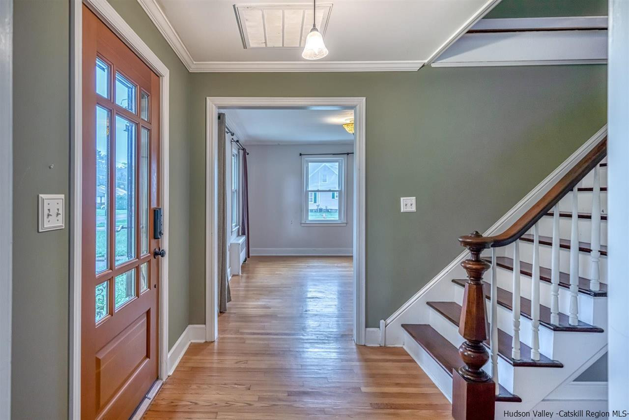 23 Spaulding Lane Saugerties, NY 12477 - Photo 2 of 35 a view of an entryway with wooden floor and stairs