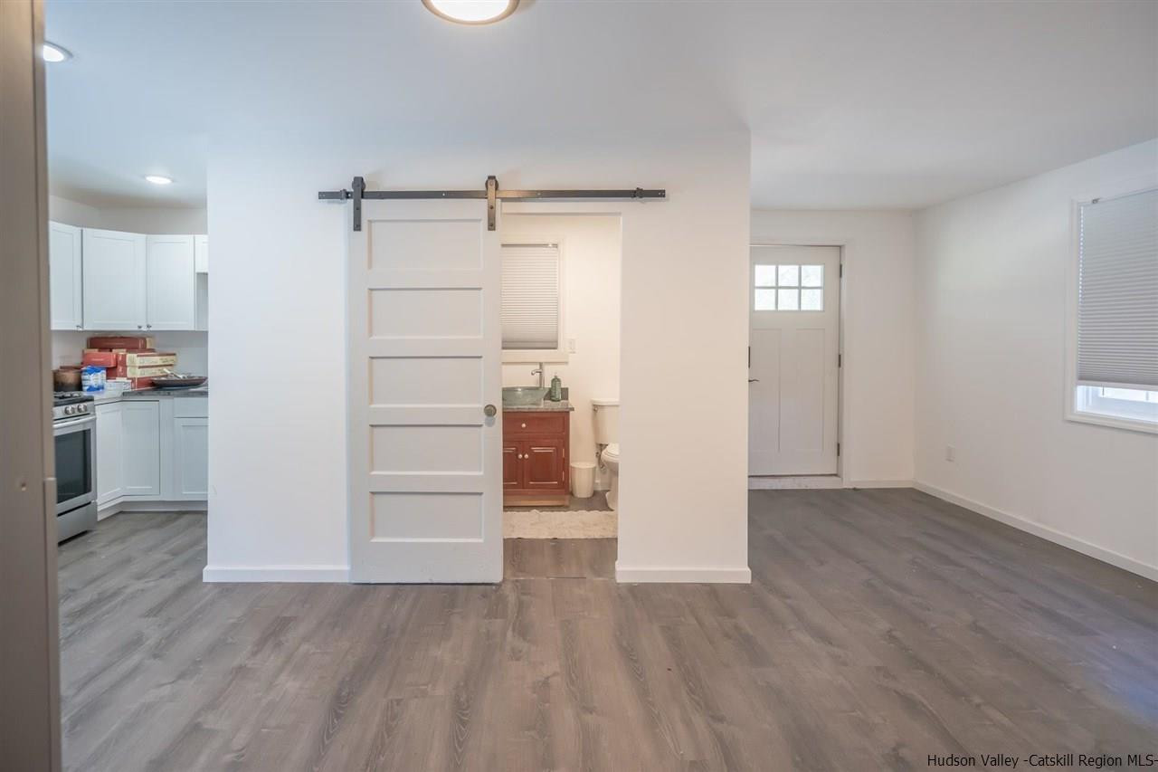 23 Spaulding Lane Saugerties, NY 12477 - Photo 28 of 35 an empty room with wooden floor and closet