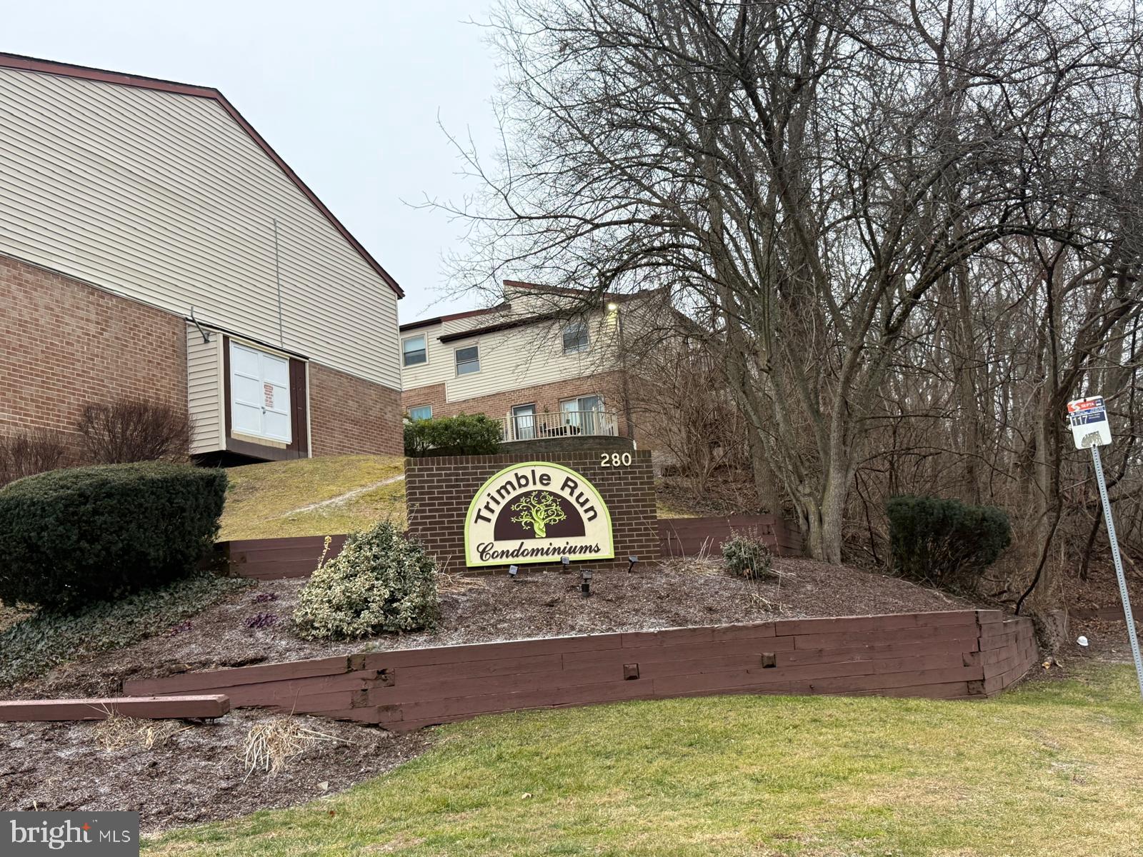 280 Bridgewater Road, Unit D10 Brookhaven, PA 19015 - Photo 1 of 12 a front view of a house with a yard