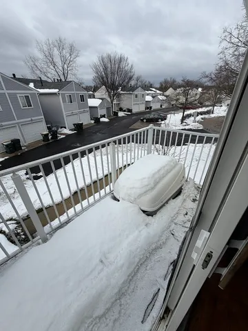 a view of balcony with furniture