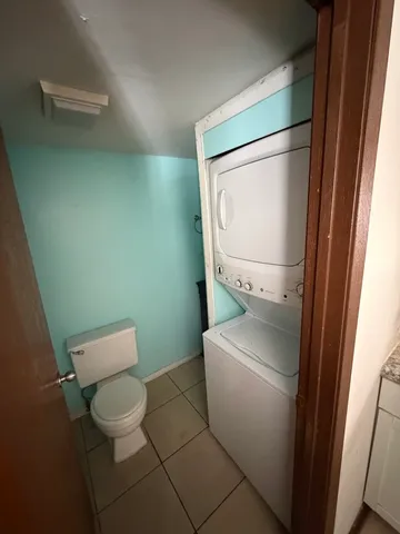 a bathroom with a toilet and a sink