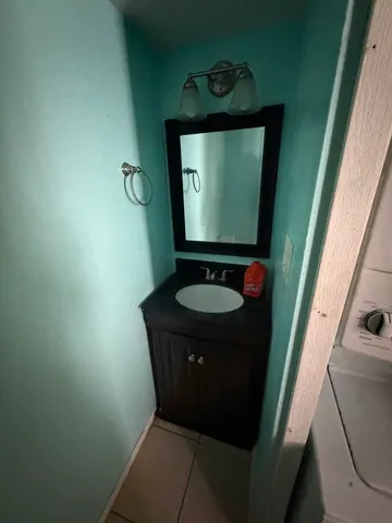 a bathroom with a toilet and a sink