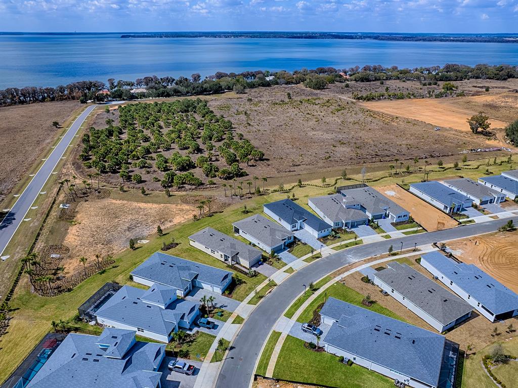 1599 Bellagio Loop Tavares, FL 32778 - Photo 43 of 75 an aerial view of residential houses with outdoor space