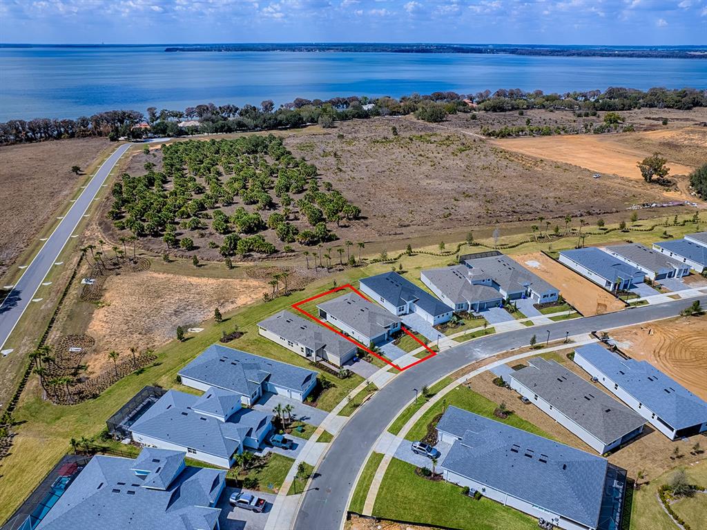 1599 Bellagio Loop Tavares, FL 32778 - Photo 44 of 75 an aerial view of residential houses with outdoor space