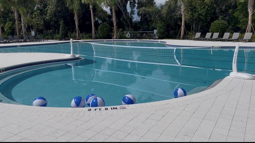 1599 Bellagio Loop Tavares, FL 32778 - Photo 61 of 75 a view of a tennis court