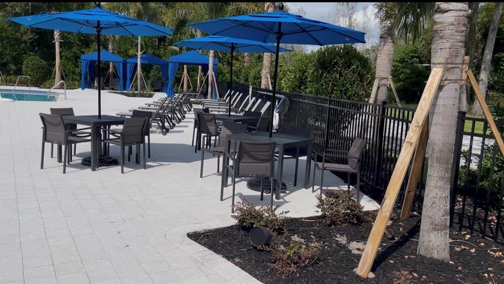 1599 Bellagio Loop Tavares, FL 32778 - Photo 63 of 75 a view of outdoor space yard and patio