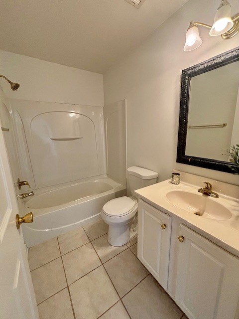 1101 Downs Boulevard, Unit B101 Franklin, TN 37064 - Photo 13 of 18 a bathroom with a sink a toilet and a mirror