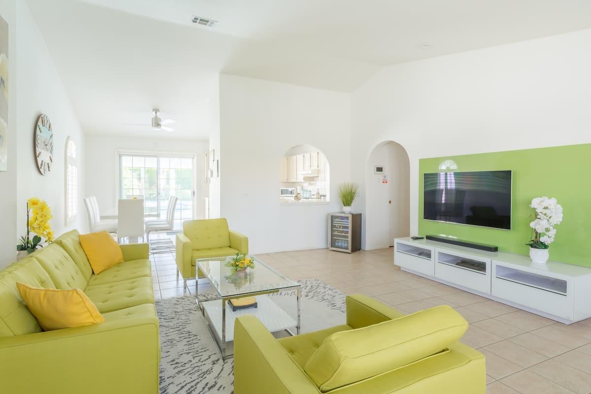 68645 Risueno Road Cathedral City, CA 92234 - Photo 16 of 17 a living room with furniture and a flat screen tv