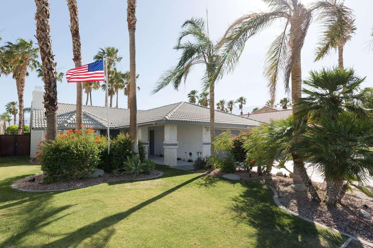 68645 Risueno Road Cathedral City, CA 92234 - Photo 17 of 17 a house with palm tree in front of it