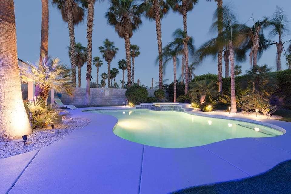 68645 Risueno Road Cathedral City, CA 92234 - Photo 6 of 17 a view of a swimming pool with an outdoor space and seating area