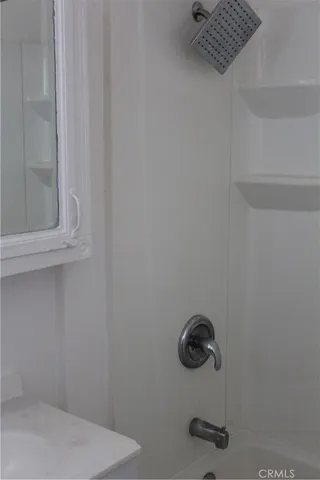 a close view of a sink and a window