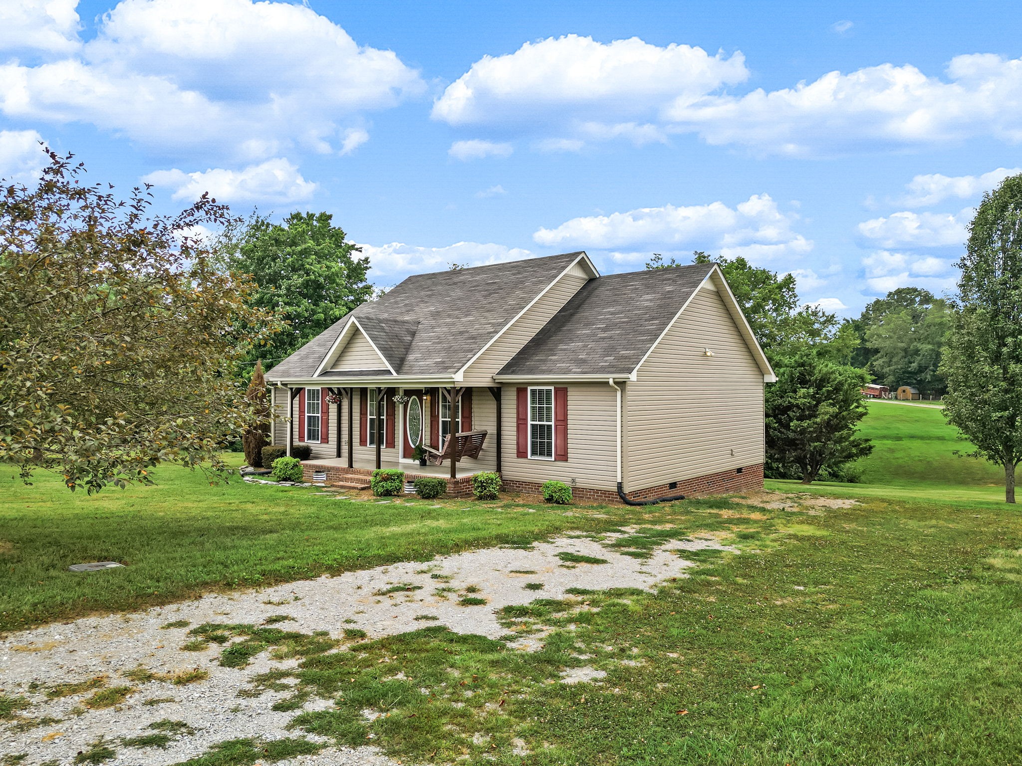 24 Shady Grove Cemetery Road Flintville, TN 37335 - Photo 11 of 40 a view of a house with a big yard and large trees