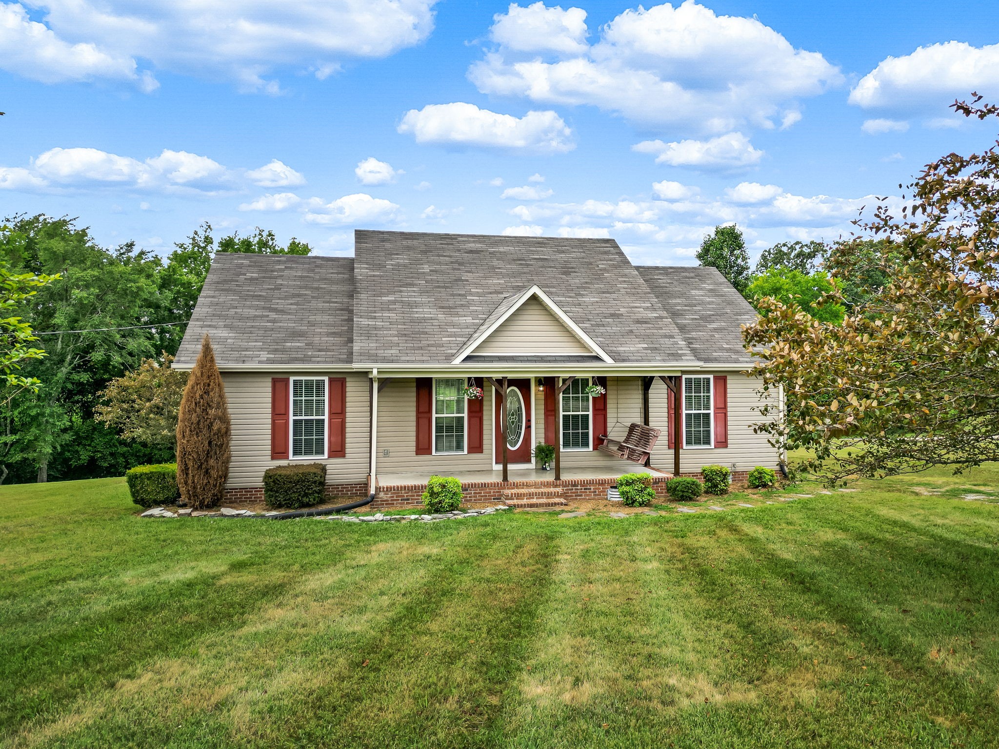 24 Shady Grove Cemetery Road Flintville, TN 37335 - Photo 12 of 40 a front view of a house with a yard