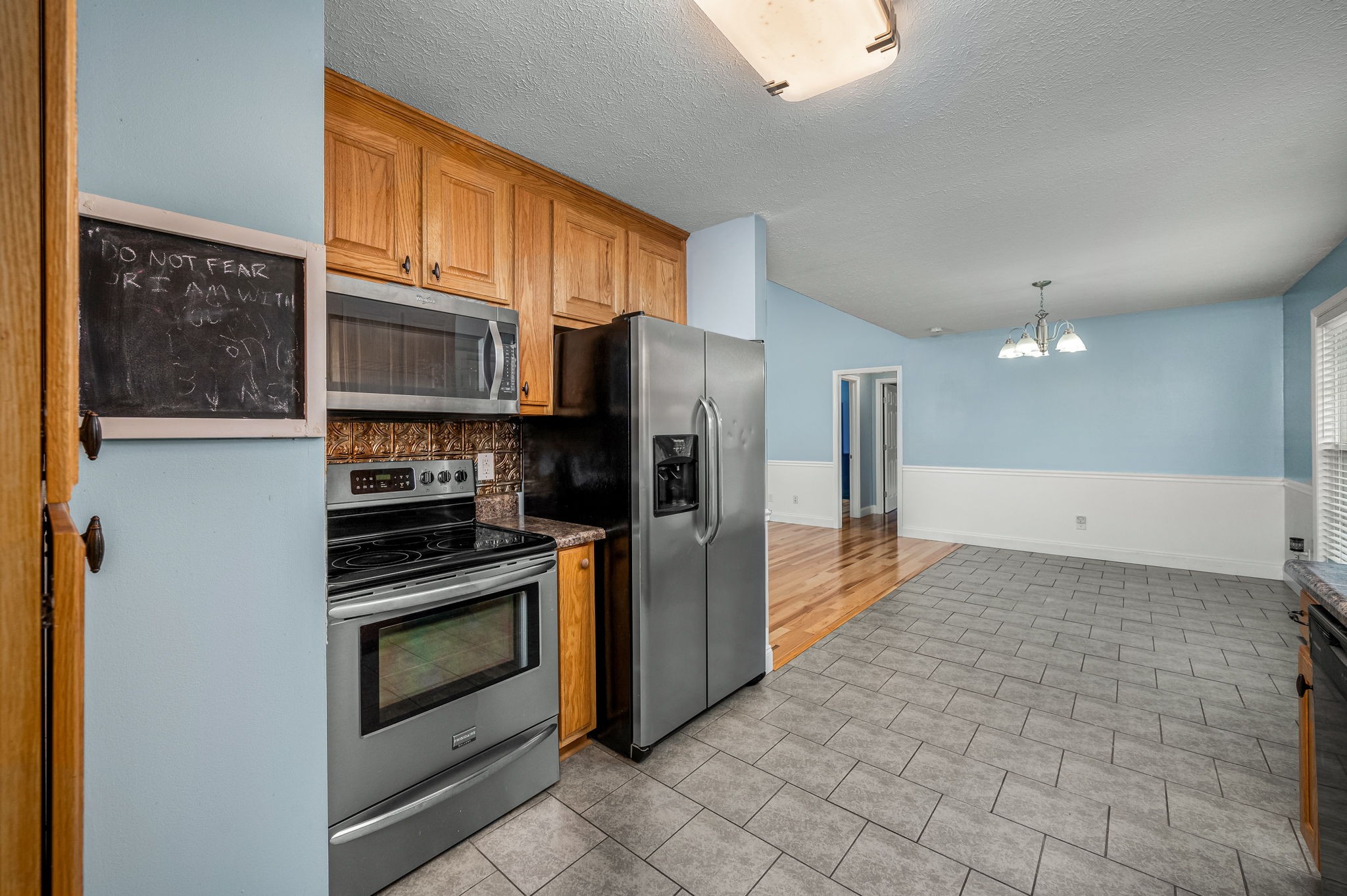 24 Shady Grove Cemetery Road Flintville, TN 37335 - Photo 24 of 40 a kitchen with stainless steel appliances a stove a refrigerator and a sink