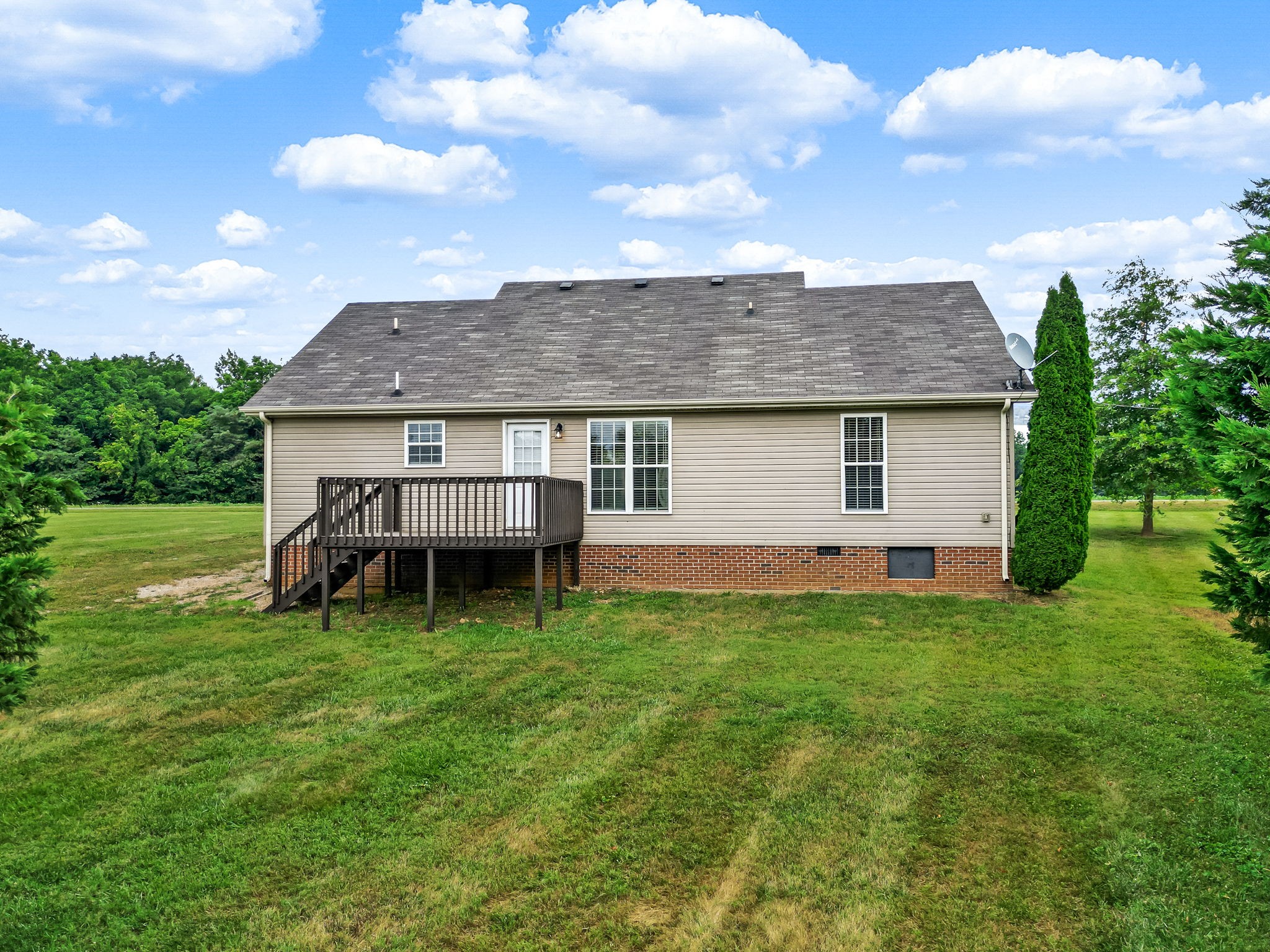 24 Shady Grove Cemetery Road Flintville, TN 37335 - Photo 35 of 40 a view of a house with a backyard