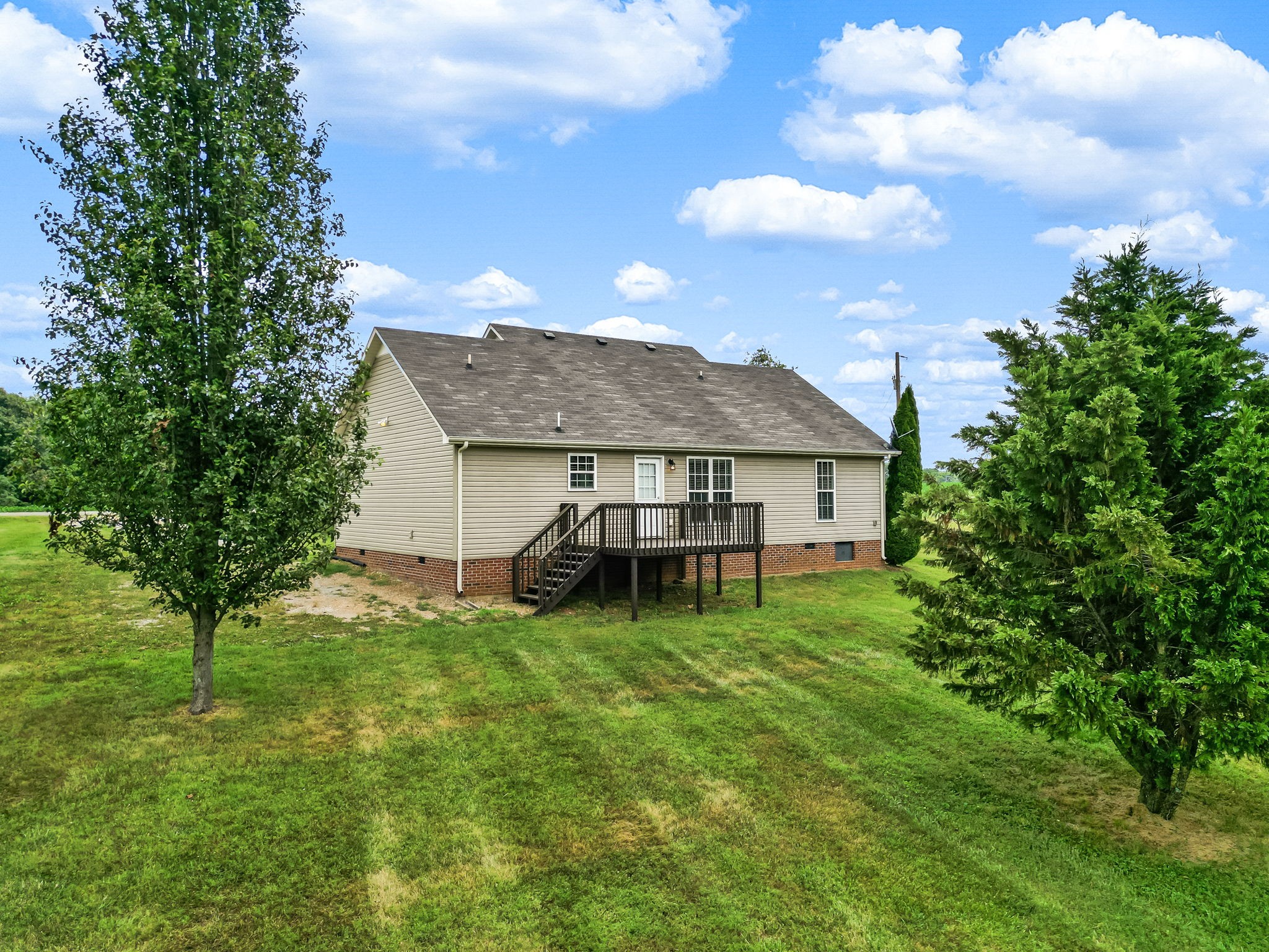 24 Shady Grove Cemetery Road Flintville, TN 37335 - Photo 36 of 40 a view of a house with a backyard