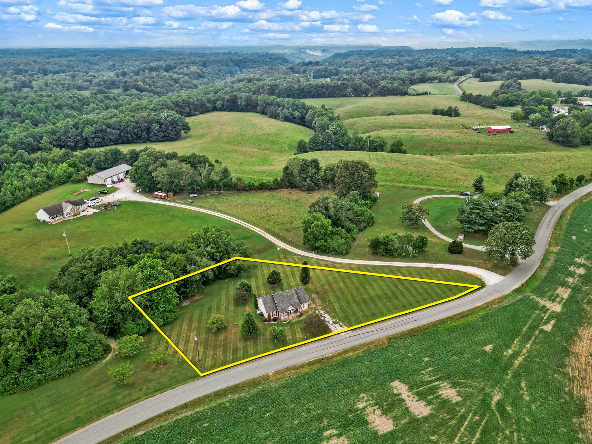 24 Shady Grove Cemetery Road Flintville, TN 37335 - Photo 6 of 40 a view of a lush green field with chairs