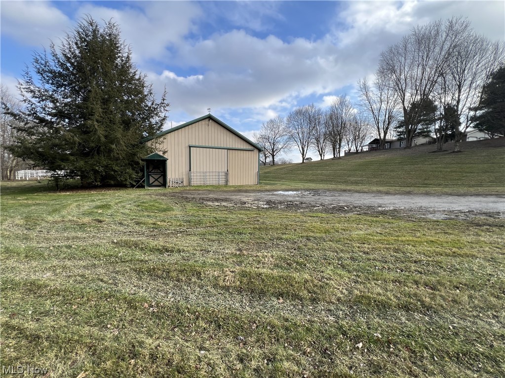 50519 Carroll Road East Liverpool, OH 43920 - Photo 33 of 45 View of yard with a storage unit