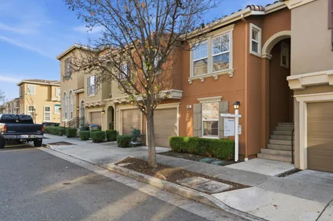 a view of a building with a street
