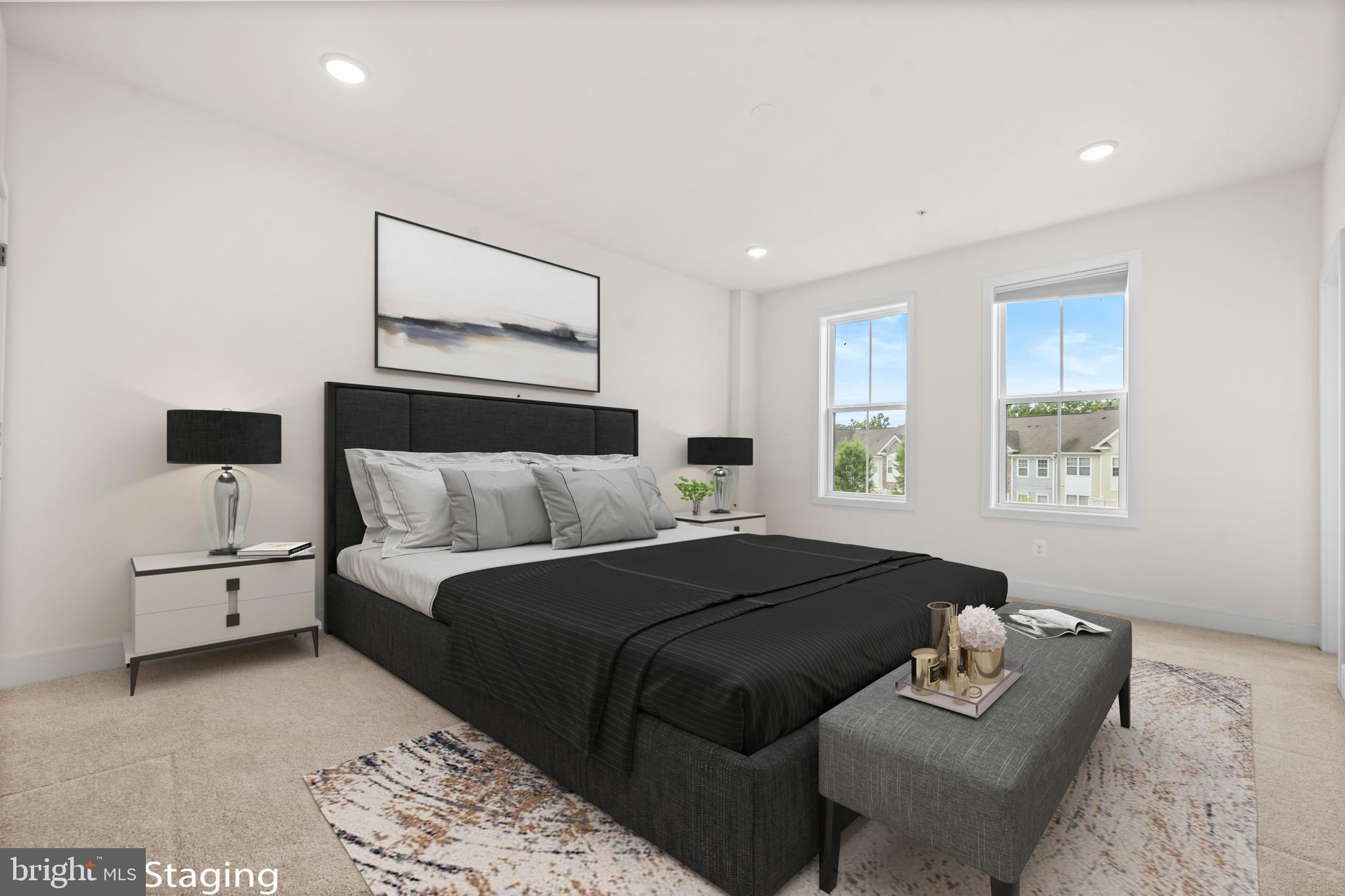 43382 Farringdon Square Broadlands, VA 20148 - Photo 18 of 34 a bedroom with a bed couch and window