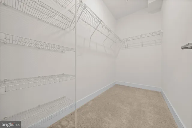 a view of a room with racks on the wall