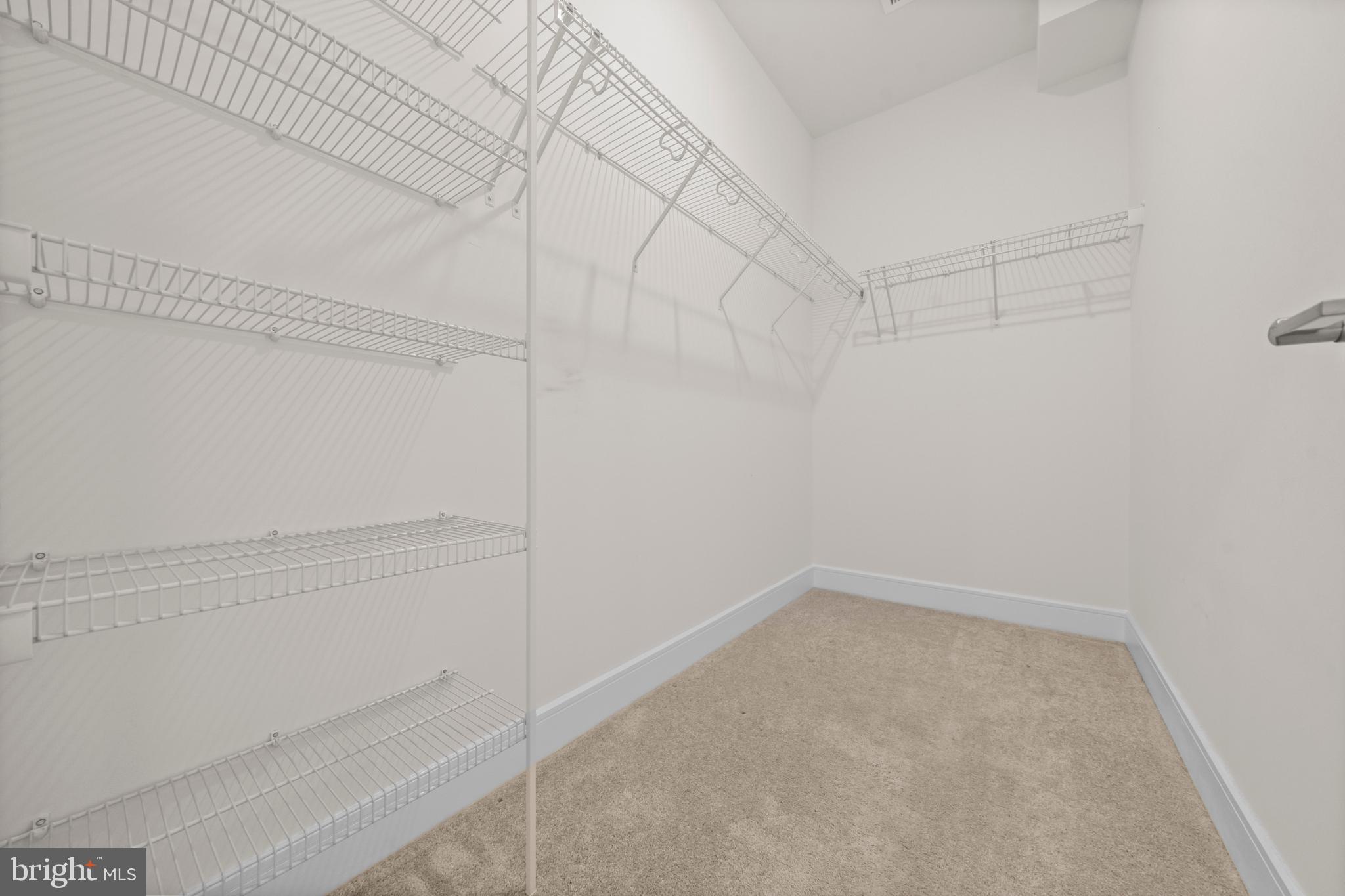 43382 Farringdon Square Broadlands, VA 20148 - Photo 23 of 34 a view of a room with racks on the wall