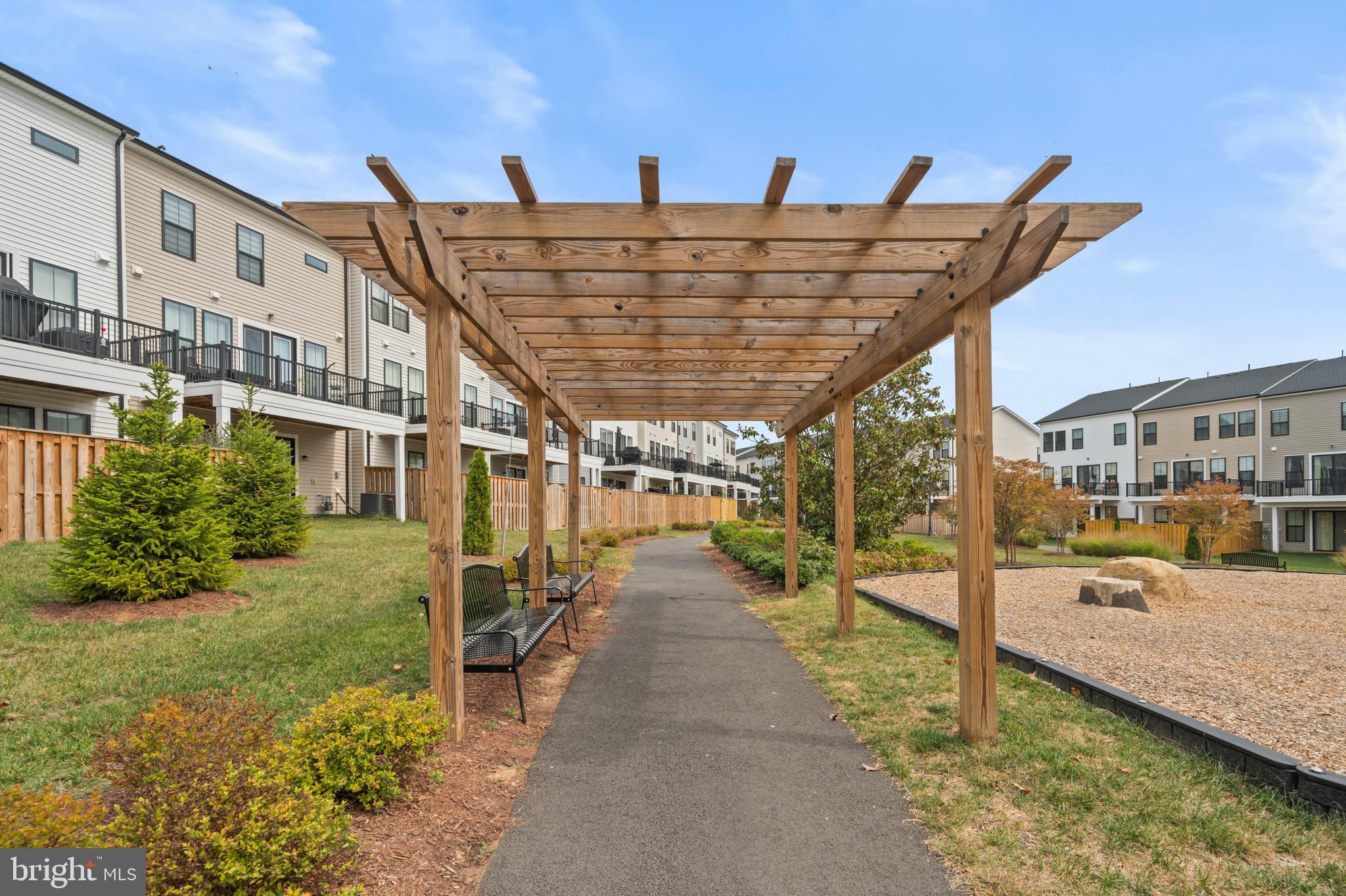 43382 Farringdon Square Broadlands, VA 20148 - Photo 33 of 34 a view of a patio with table and chairs potted plants