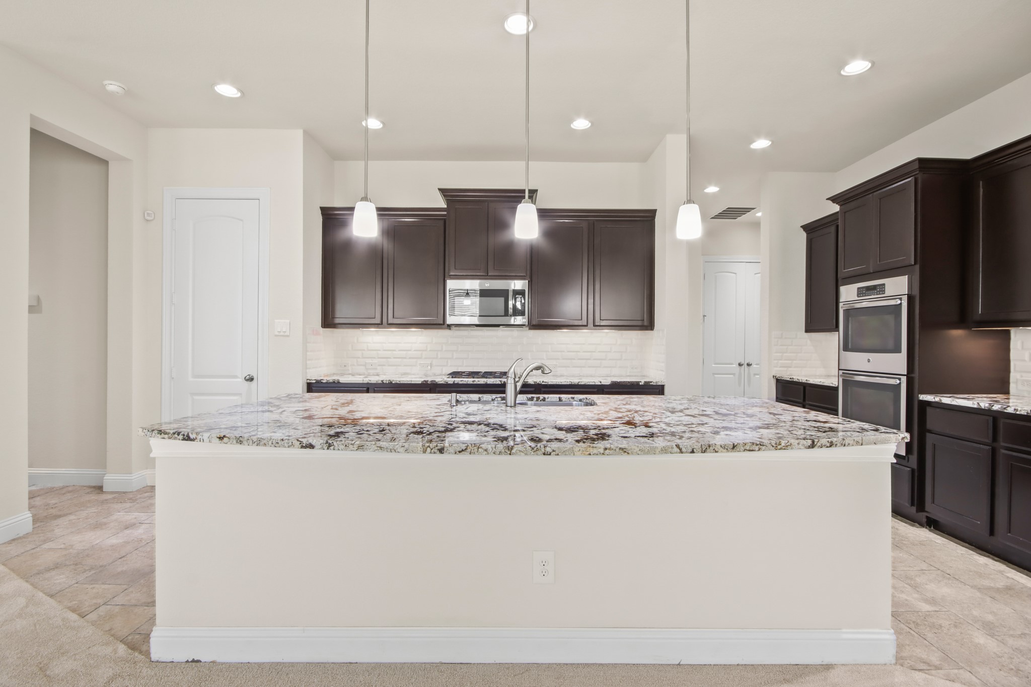 8931 Leaning Hollow Lane Spring, TX 77379 - Photo 8 of 38 View of the Kitchen straight over from the Dining Room.