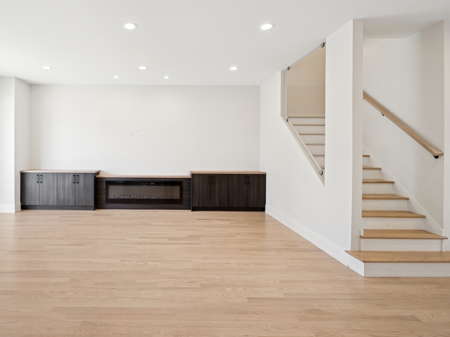 967 East 62nd Street, Unit 2 Chicago, IL 60637 - Photo 2 of 8 a view of an empty room with stairs and stairs