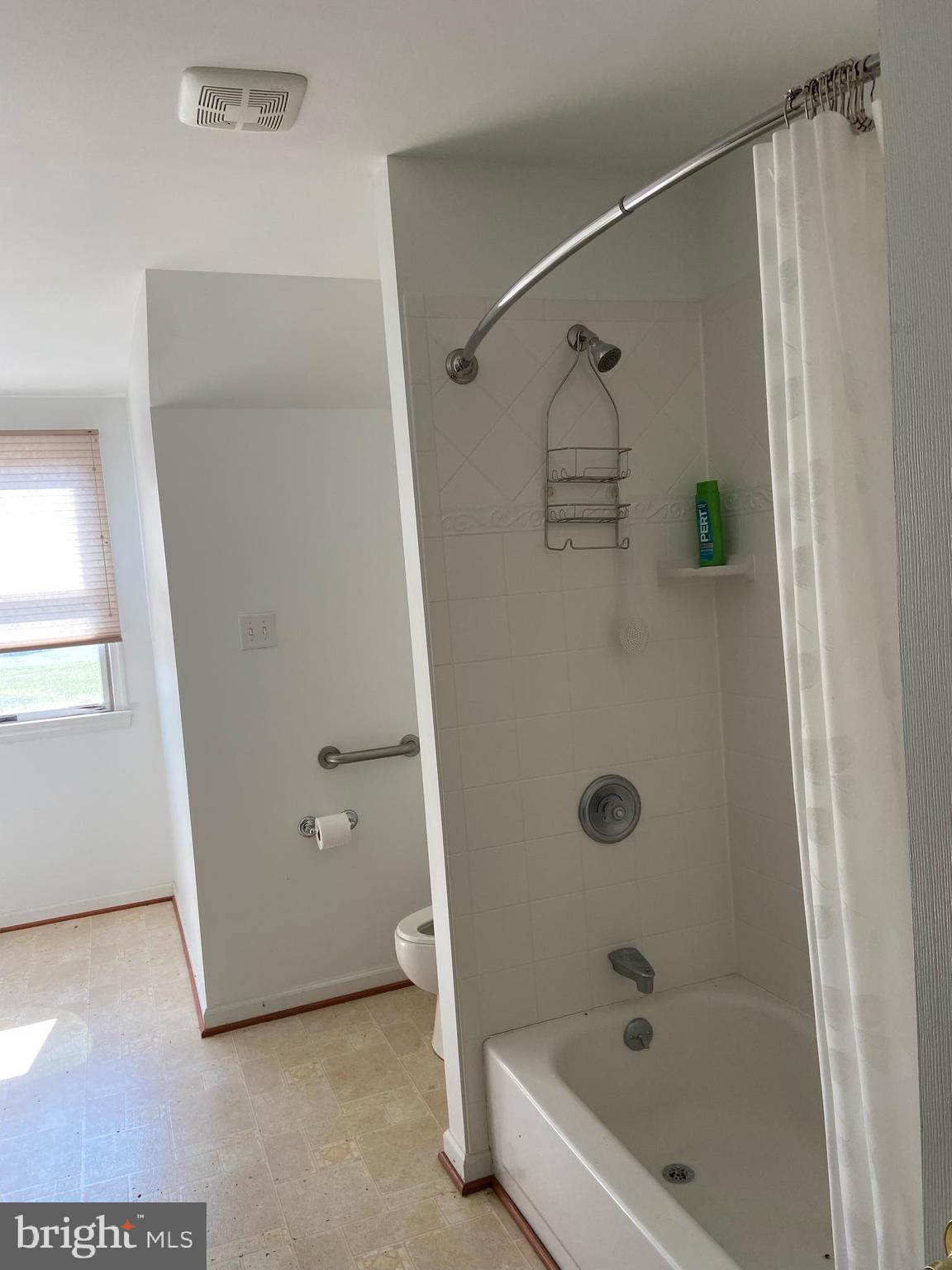 12550 Shoemaker Road Taneytown, MD 21787 - Photo 20 of 30 a bathroom with a shower and a tub