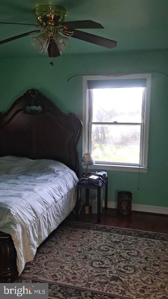 12550 Shoemaker Road Taneytown, MD 21787 - Photo 24 of 53 a bedroom with a bed and a window
