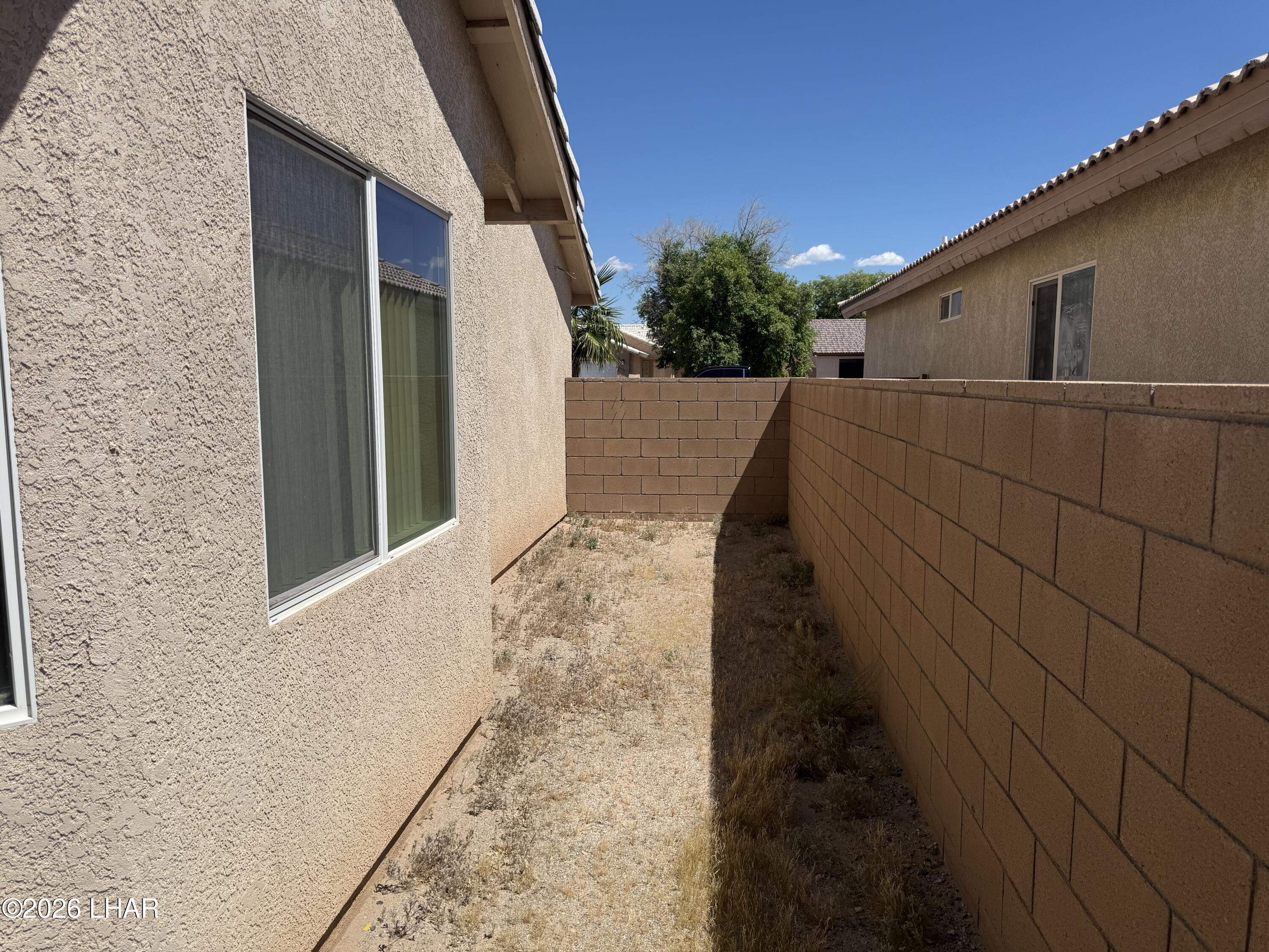 4897 South Rinaldi Drive Fort Mohave, AZ 86426 - Photo 20 of 22 a view of a back yard of the house