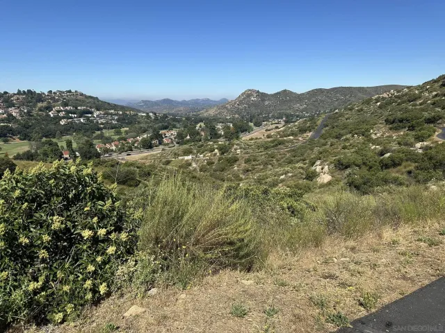 a view of swimming pool with a yard and outdoor seating