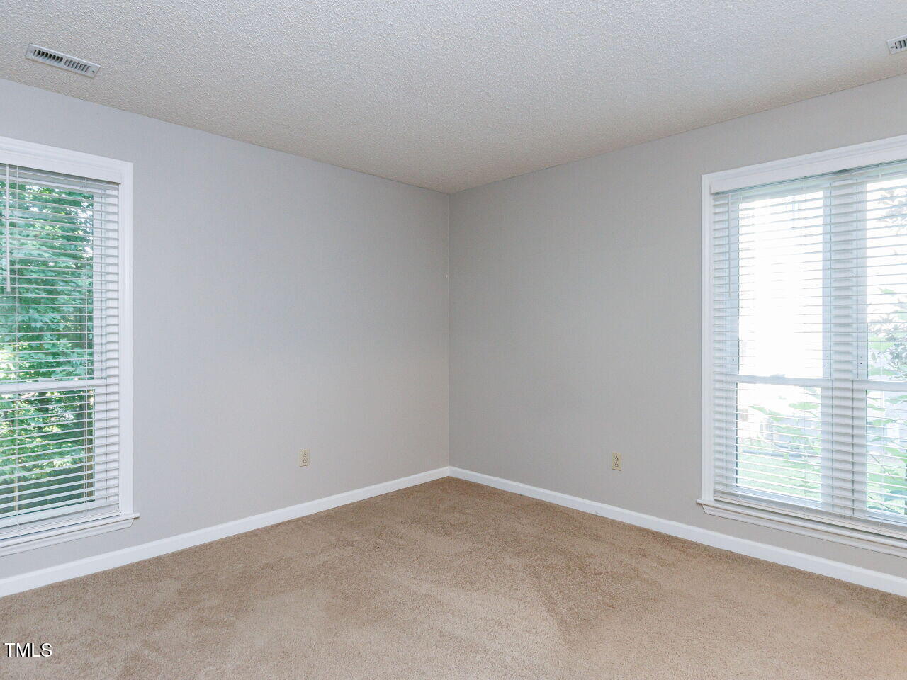 4621 Timbermill Court, Unit 101 Raleigh, NC 27612 - Photo 23 of 37 023-1280x960-bedroom