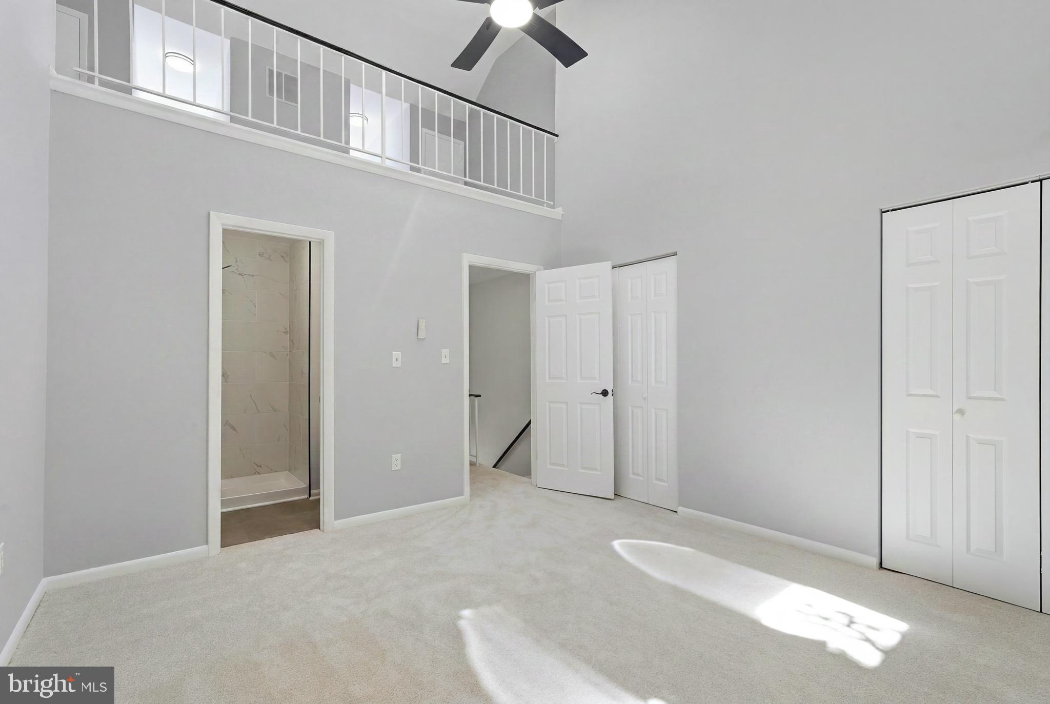 3682 Masthead Trail Triangle, VA 22172 - Photo 35 of 53 an empty room with fan and windows