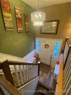 a bathroom with a sink a mirror and a toilet