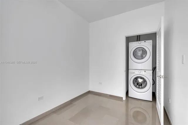 a view of washer and dryer in a room