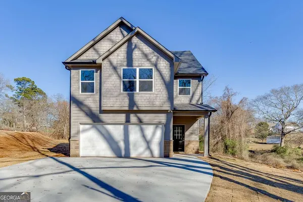 a front view of a house with a porch