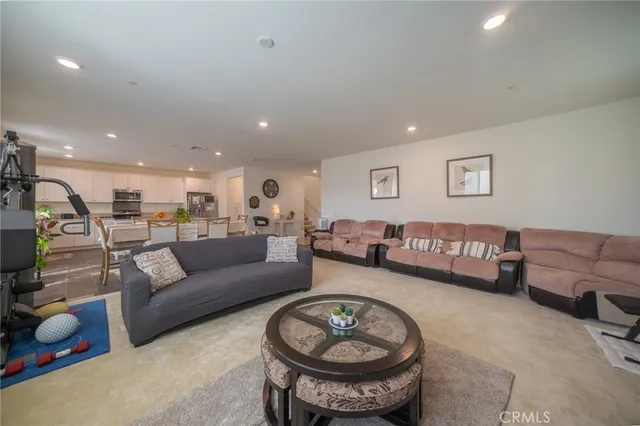 a living room with furniture and a couch