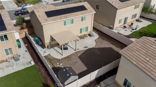 an aerial view of a house with balcony