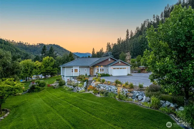 a view of front of house with a yard