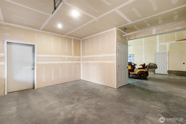 a view of empty room with a flat screen tv